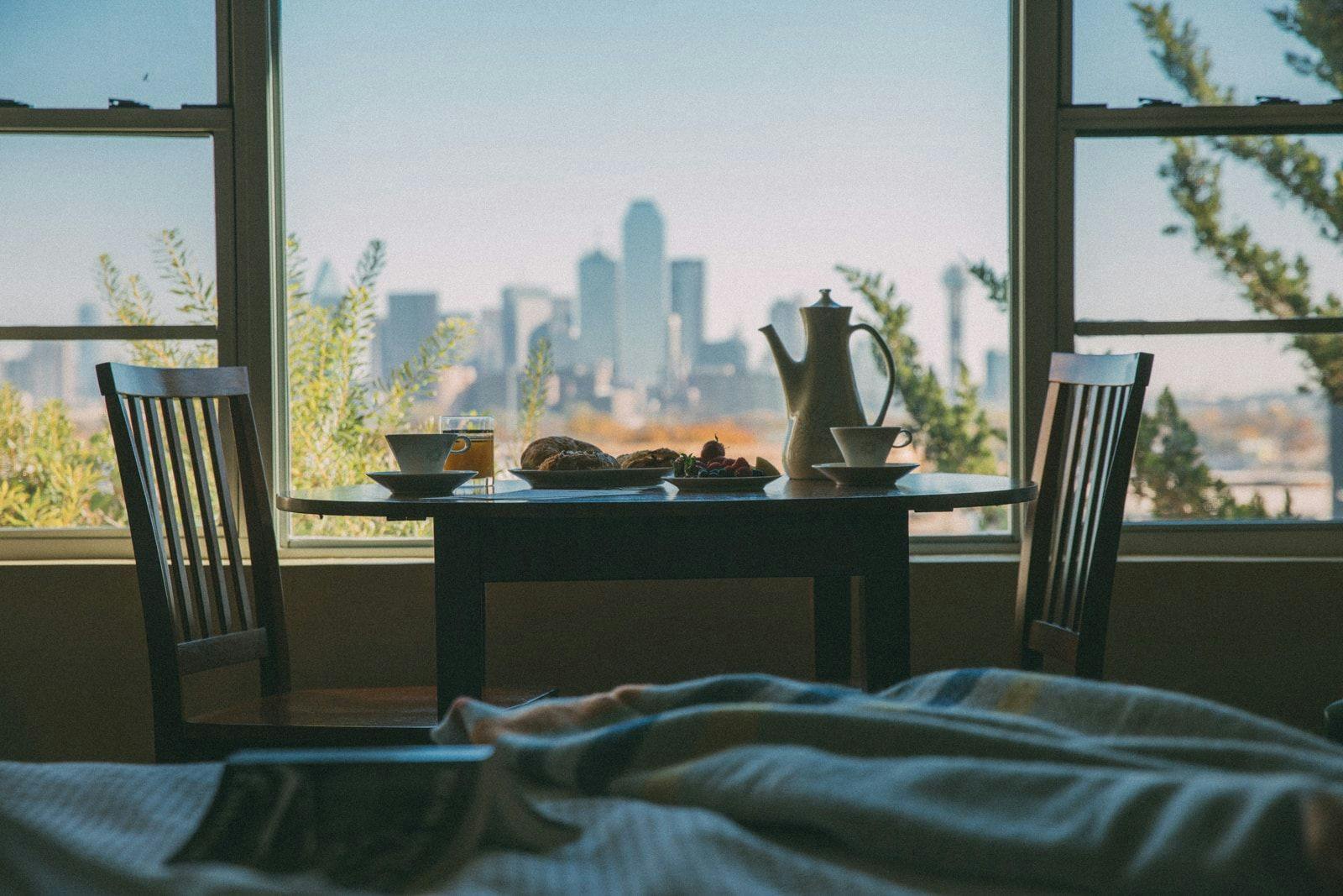 Breakfast table in front of a window