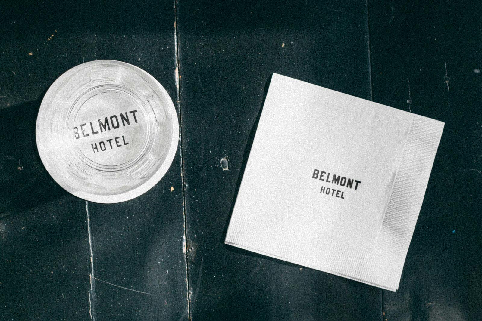 Belmont Hotel napkins and a glass cup