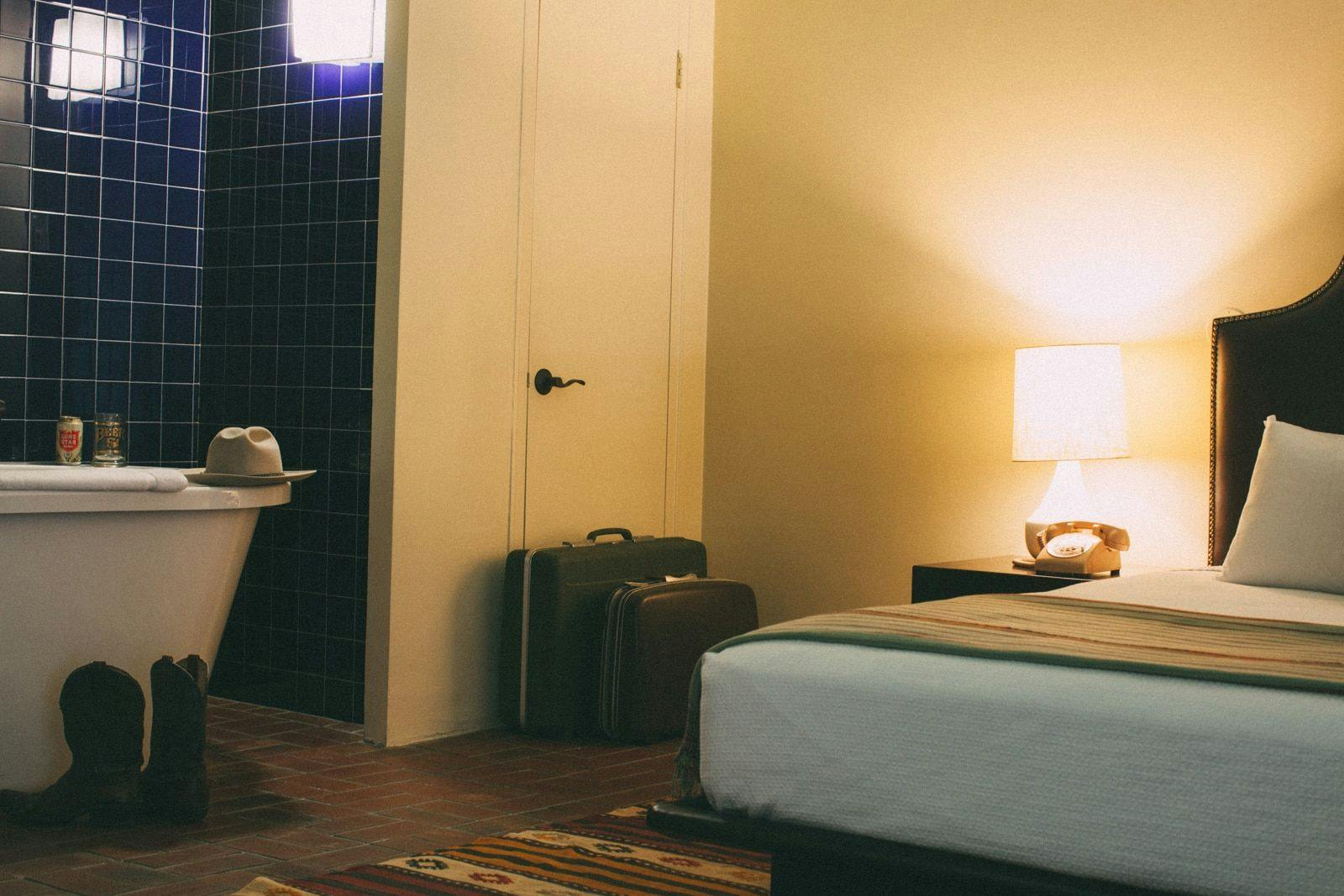 Hotel bedroom with a bathtub