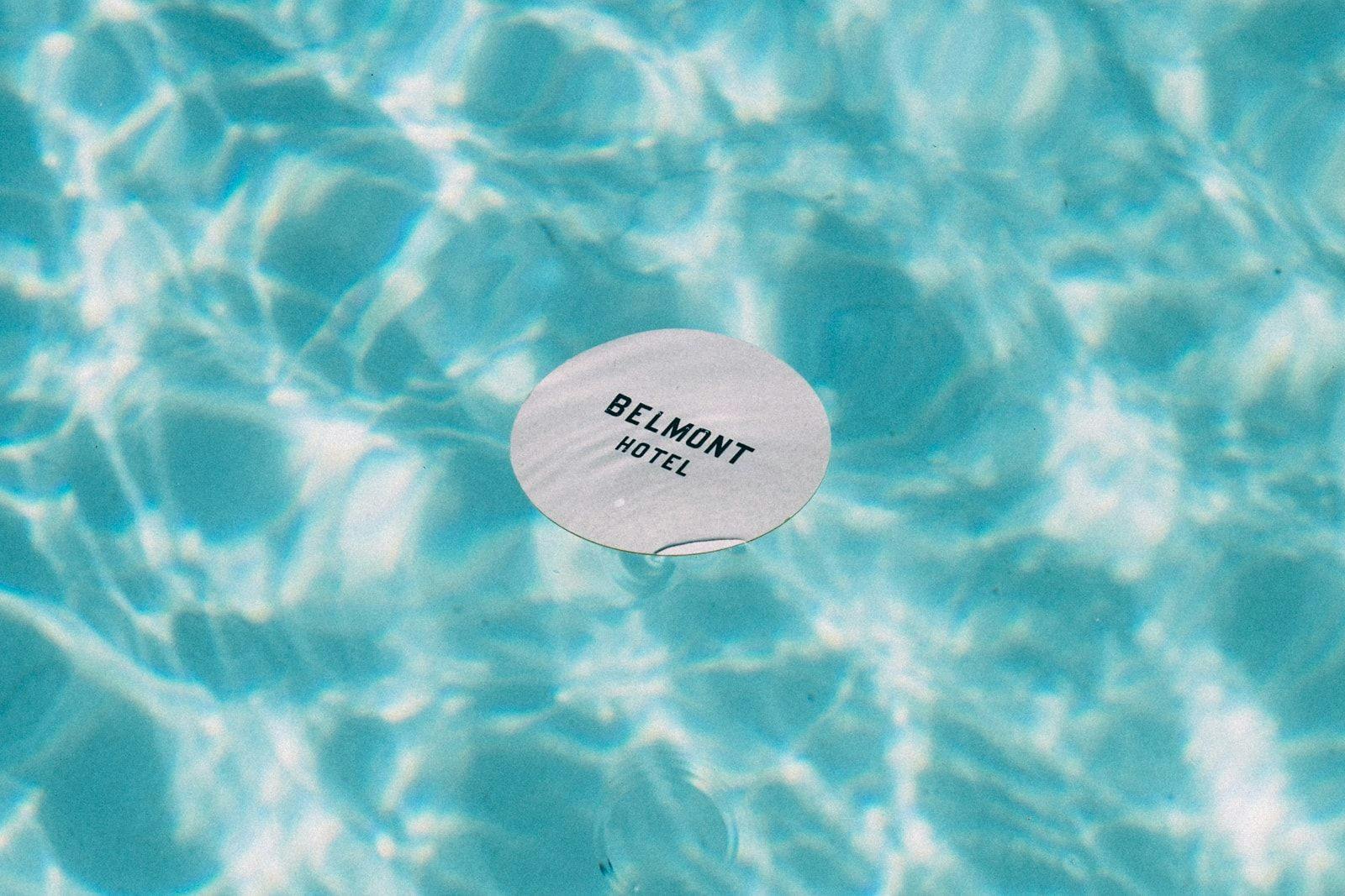 Belmont Hotel coaster floating in pool