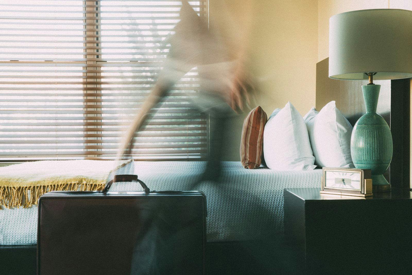 Blurred movements of a guest in their hotel room