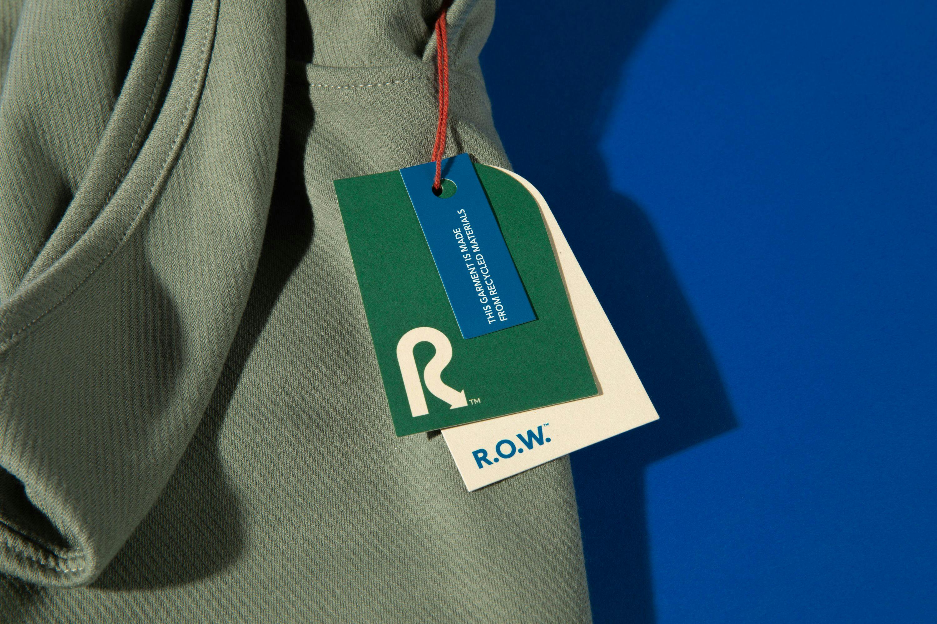 Green activewear garment with product tags